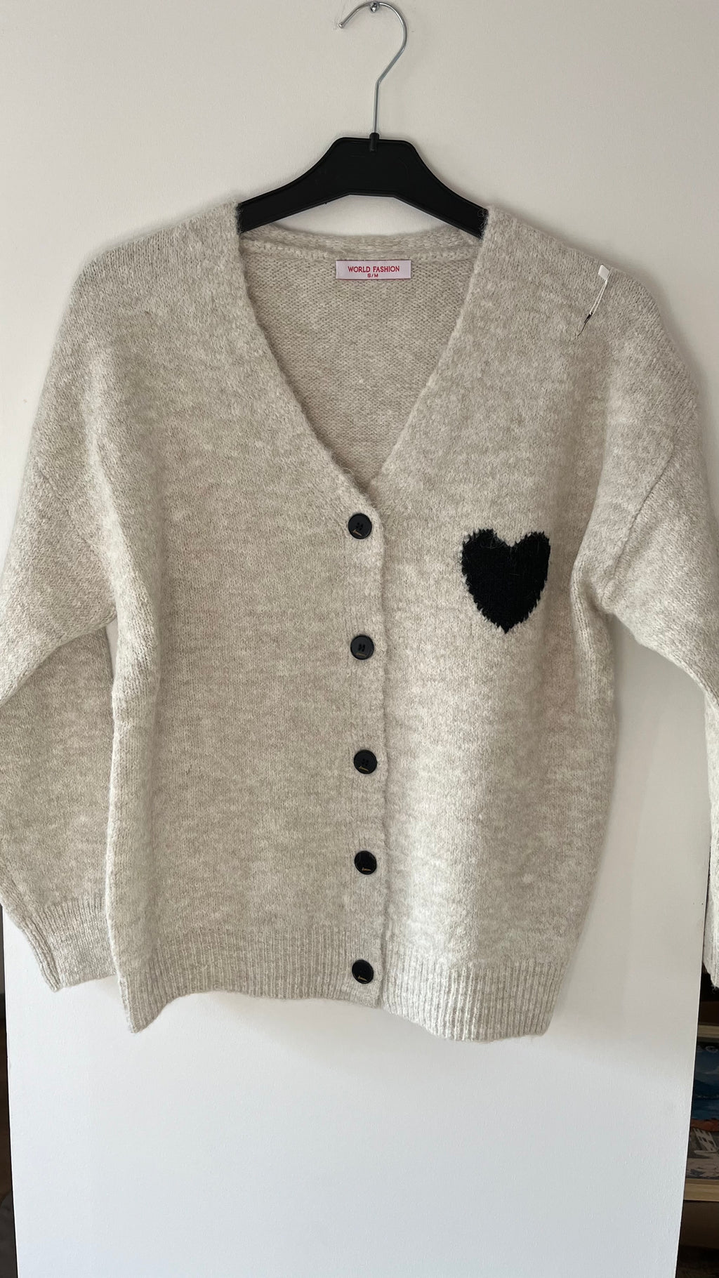 Cardigan en laine et matière recyclée avec cœur