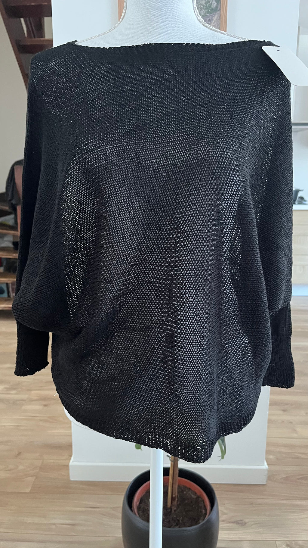 Pull maille fine avec nœud dos ouvert..