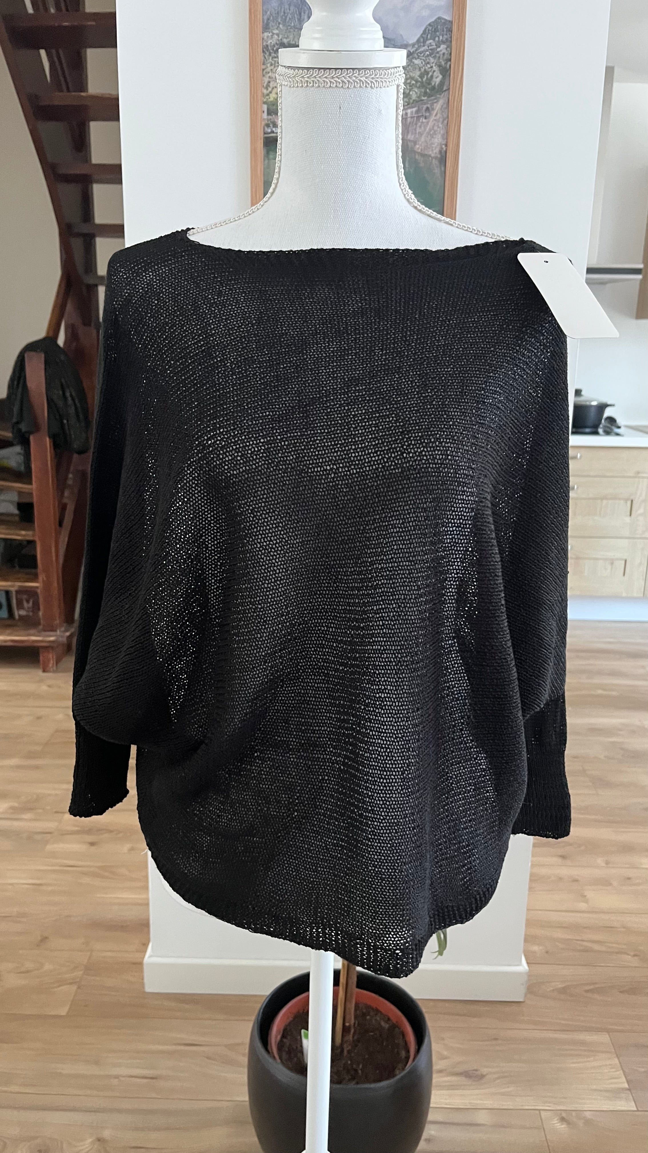Pull maille fine avec nœud dos ouvert..