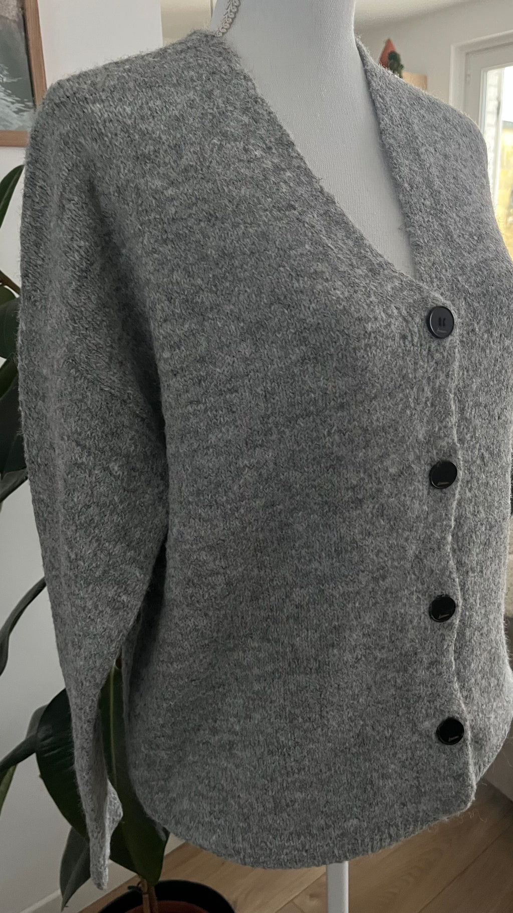 Cardigan en laine et matière recyclée avec cœur