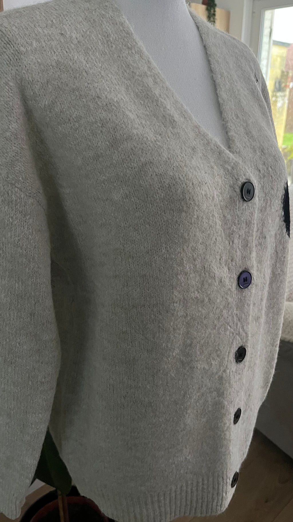 Cardigan en laine et matière recyclée avec cœur