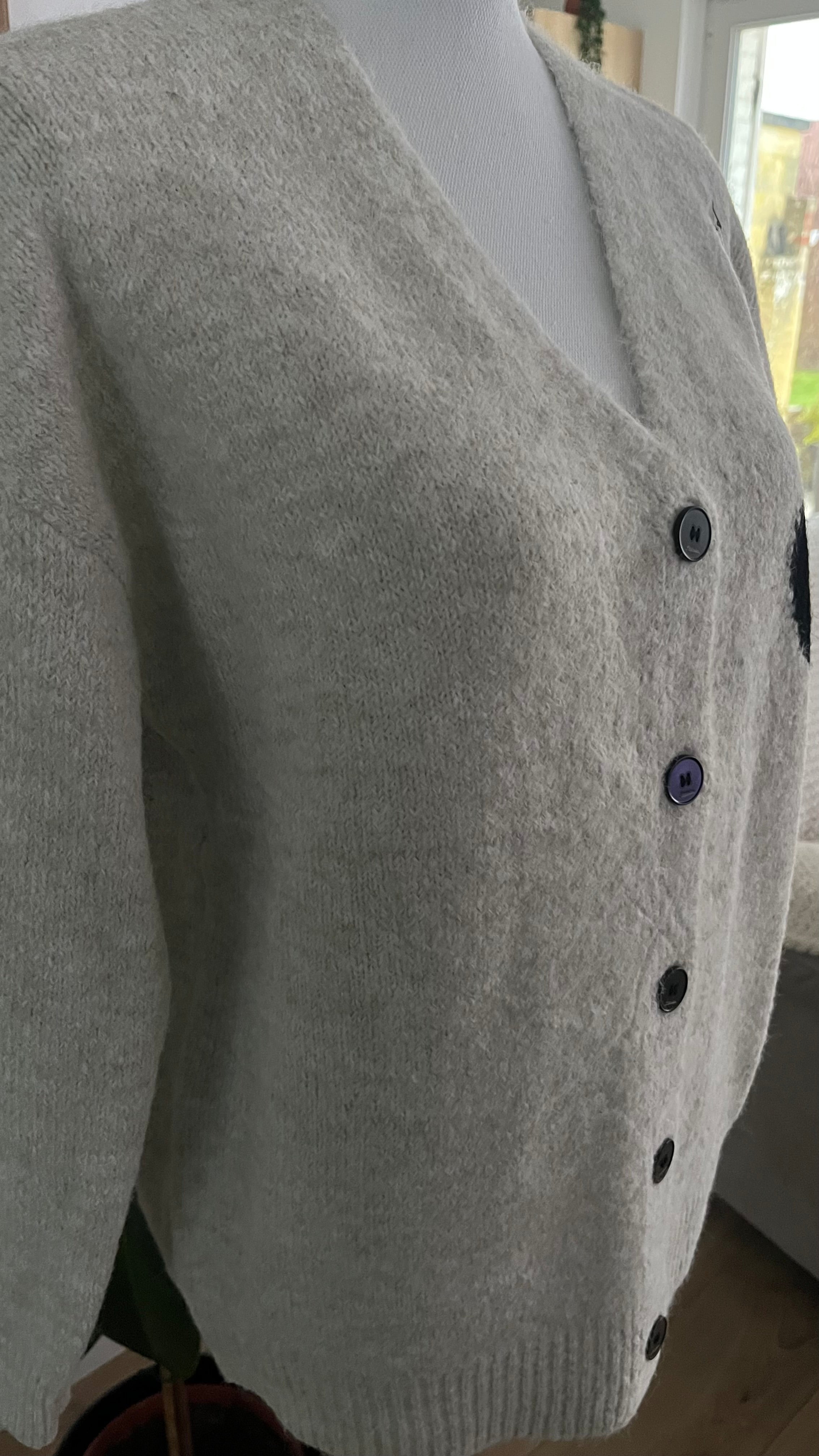 Cardigan en laine et matière recyclée avec cœur