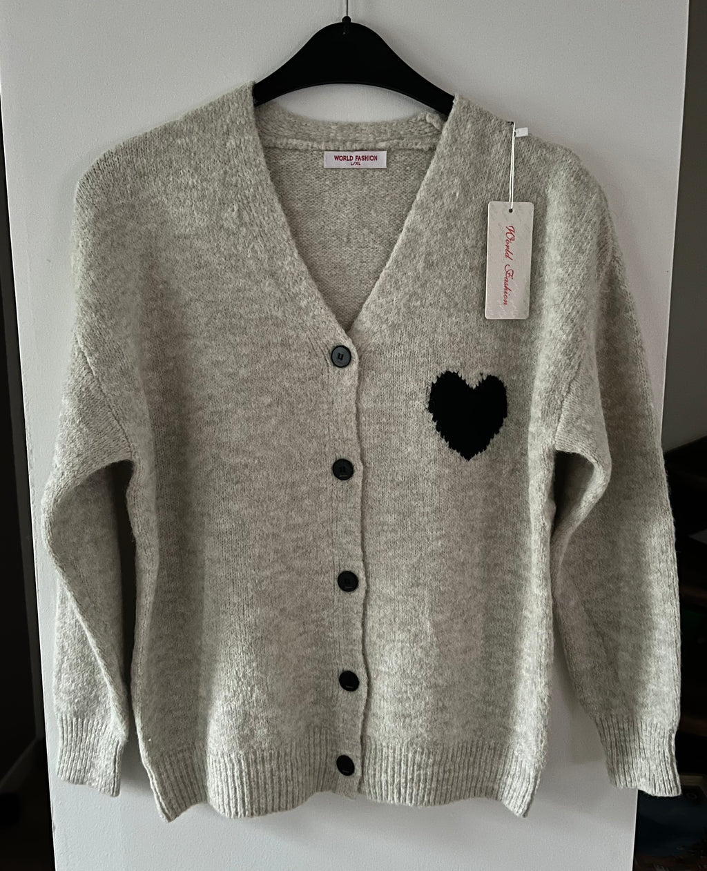 Cardigan en laine et matière recyclée avec cœur